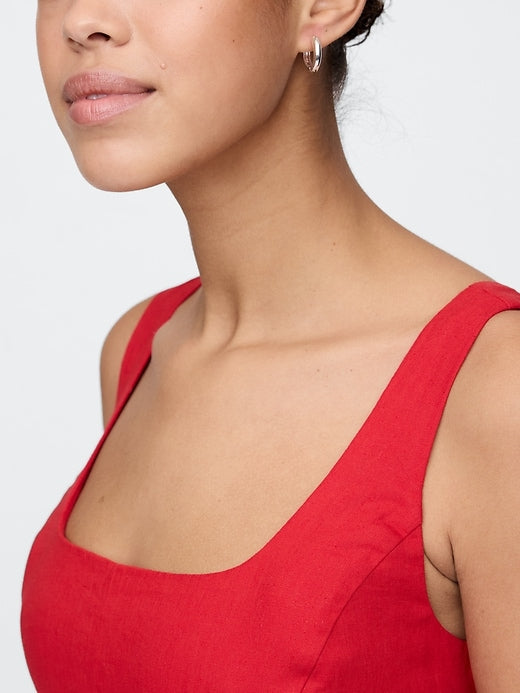 Can you suggest midi dresses with embroidered details that are stylish yet easy to care for?